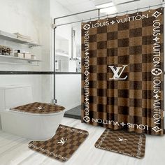 a bathroom with a checkered shower curtain and matching rugs is shown in brown