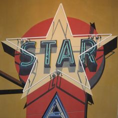 a large star sign on the side of a building