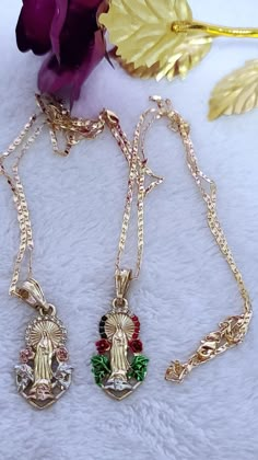 "Special for you. We offer free shipping with the purchase of 35 dollars or more! with First Class Mail (Not Priority Mail) Virgin Mary (Guadalupe Virgin) with Roses Necklace Gorgeous Virgen de Guadalupe Pendant with Rose flowers surrounding her heavenly image! *Pendant Height: 1.75\" inches *Pendant Width: 0.5\" inch *14k Tricolor Gold Plated *Includes 18,\", 20\", 24\" inches chain Material: Copper Measurements: example Chain - 12 inch. from top to bottom (24\" Long from end to end) *ABOUT US* Mexican Jewelry Gold, Hispanic Jewelry, Quince Gifts, St Jude Necklace, Mary Guadalupe, Guadalupe Necklace, Quinceanera Jewelry, Latina Jewelry, Dope Jewelry Accessories