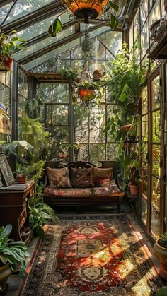 a living room filled with lots of plants and furniture