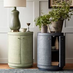 two side tables with plants and vases on them