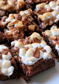 there are many brownies with marshmallows on top