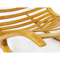 a close up of a wooden chair on a white background