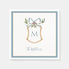 a greeting card with the letter m on it and an image of a bow in the middle