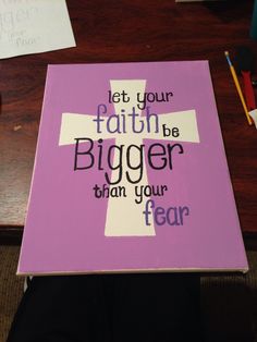 a pink canvas with the words let your faith be bigger than your fear