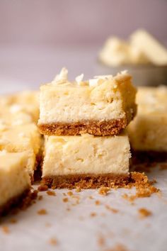 three pieces of cake sitting on top of a table