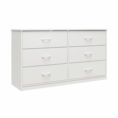 a white dresser with four drawers on it