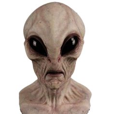 an alien head with black eyes and no hair on the face is shown in front of a white background