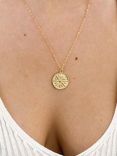 "Gold Sun Necklace, Coin Necklace, gold necklace, layering necklace, sun necklace, gold coin necklace, medallion necklace, dainty gold jewelry, minimal jewelry ♥Beautiful and delicate sun medallion gold disc necklace ♥Wear this necklace alone or layer it with your favorites. ♥A delicate 14k gold filled chain, with a hint of shimmer adorned with a gold filled disc pendant ♥Pendant measures 18mm x 22mm - about the size of a penny ♥LENGTH - The moon necklace shown on the model is 18\" long. Please Dainty Sun Design Jewelry For Everyday, Dainty Sun Design Jewelry For Everyday Wear, Dainty Everyday Sun Design Jewelry, Gold Necklace With Sun Design Round Pendant, Gold Sun Design Round Pendant Necklace, Dainty Everyday Necklaces With Sun Design, Dainty Sun Design Necklace For Everyday, Gold Plated Sun Design Necklace As Gift, Gold Plated Sun Design Necklace Gift