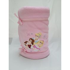 a pink baby blanket with princesses on it