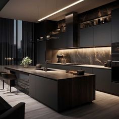 a modern kitchen with black cabinets and counter tops is lit by recessed lighting above the island