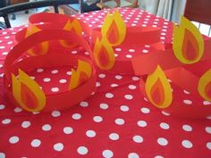 red and white table cloth with yellow flames on it