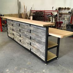 a workbench made out of wood and metal