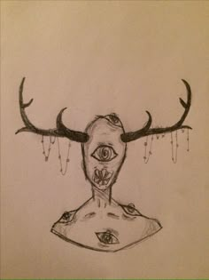 a drawing of a man's face with horns and eyes on his head is shown