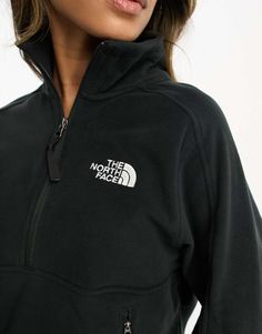 Coats & Jackets by The North Face Stand out, stay warm Branded design Funnel neck Partial zip closure Long sleeves Zip pockets Regular fit Half-zip Winter Sweatshirt For Outdoor Activities, Half-zip Outerwear For Outdoor Activities, Half-zip Track Jacket For Fall Outdoor Activities, Fall Half-zip Track Jacket For Outdoor Activities, Black Fleece Funnel Neck Outerwear, Black Functional Half-zip Outerwear, Functional Half-zip Track Jacket For Fall, Black Half-zip Winter Outerwear, Black Half-zip Fleece Jacket For Fall