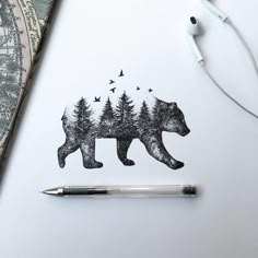 a drawing of a bear with trees and birds on it