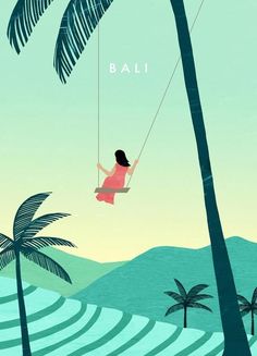 a woman swinging on a rope between two palm trees in the ocean and an island