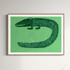 a green poster with an alligator's head in the middle and another crocodile's tail sticking out