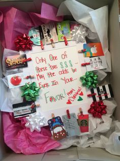 an open box with some writing on it and lots of different items in the package