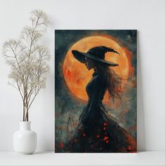 a painting of a woman wearing a witches hat in front of a full moon