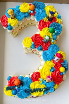 the letter e is made up of cupcakes and icing