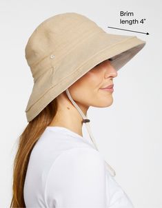 [[start tab]] SUN PROTECTIVE SUN HAT PRACTICAL SUN PROTECTION Our Holiday Sun Hat is sure to be your go-to sun hat if you're looking for maximum coverage and style. The brim is flexible and benefits from an internal wire to give it a fully customizable shape. Adjustable to your size and style, the hat features a reversible double layer of luxurious cotton-linen blend fabric with a drawcord to keep it secure. Easy to pair with any outfit, it will keep your face, ears and neck protected whilst kee Summer Lightweight Adjustable Bucket Hat, Lightweight Adjustable Fit Summer Bucket Hat, Lightweight Hats With Uv Protection For Beach Season, Spring Bucket Hat With Uv Protection And Adjustable Fit, Lightweight Upf 50+ Bucket Hat For Spring, Lightweight Wide Brim Hat For Warm Weather, Outdoor Straw Hat With Upf 50+, Summer Hats With Upf 50+ For Warm Weather, Lightweight Hats With Upf 50+ For Beach Season