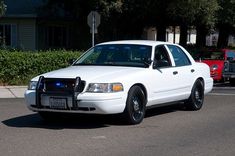 a police car is parked in the parking lot