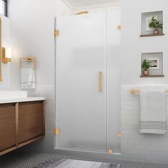 a bathroom with a sink, mirror and shower stall