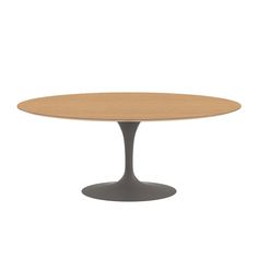 an oval wooden table with grey base