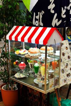 a display case with food and drinks on it