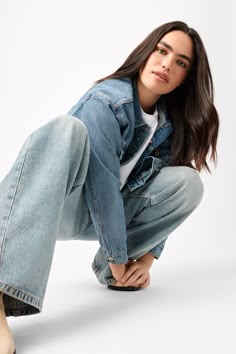 Charlene Maria is a photographer based in New York. She shoots everyday fashion. Here is an image of a girl in a denim outfit with jeans, a white tee, denim jacker, and cowboy boots. Shot in studio on a white backdrop. The model poses for a full body image and has dark brunette hair. This is a great simple minimal outfit. Outfit With Jeans, Dark Brunette Hair, Dark Brunette, Cosmetics Photography, Minimal Outfit, White Backdrop, Professional Fashion, Denim Branding, Brunette Hair