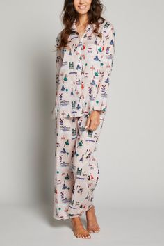 Pour Les Femmes’ Travel Series Long-Sleeve Paris Pajama Set Highlighting iconic landmarks of Paris. Featuring a long sleeve button-front top with breast pocket, paired with an adjustable elastic waistband pant. This garment includes a matching lingerie bag. Handcrafted with slightly sheer 100% Egyptian Cotton LawnMade in our Fair Trade Workshop in the Indus Valley Model 5'8" Wearing: Size SmallDesigned for a classic fit. Made true to size CARE INSTRUCTIONS Machine Wash ColdDelicate CycleTumble D Yellow Pumps, Indus Valley, Pastel Dress, Elastic Waistband Pants, Cotton Pajamas, Power Dressing, Button Front Top, Polka Dot Skirt, Dot Skirt