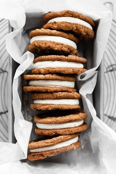 a box filled with cookies covered in frosting