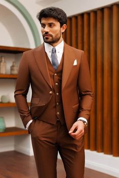 "This is a Classic 3 Piece Suit by Golden Attire crafted from high quality fabric and imported materials. Our products are handcrafted by experienced tailors who make sure the that the stitching is precise, lining is proper and the overall product is sturdy enough to not go out of shape for more than a few years. Also all our products have extra margins in their length, sleeves, sides so it's easily alterable if your size changes after some time. To see more available colours and designs in this collection, Check out the 'Classic Two Piece Suits' Section. *This is a 3 piece set  and a trouser. *We also offer customization so we can provide you an even better fit if you massage us your measurements (in inches) of Chest, Stomach, Waist, Hip, Shoulder and Actual Height after ordering. *Want t Brown Notch Lapel Suit For Groom, Tailored Brown Suit For Groom, Tailored Brown Blazer For Wedding, Brown Groom's Blazer In Suiting Fabric, Brown Blazer For Groom In Suiting Fabric, Elegant Brown Three-piece Suit For Groom, Brown Blazer For Grooms, Brown Three-piece Suit With Notch Lapel For Wedding, Brown Notch Lapel Three-piece Suit For Wedding