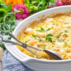 a white bowl filled with macaroni and cheese