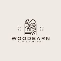 the logo for wood barn is shown in black and white, with an image of trees on