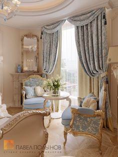 a living room filled with furniture and a chandelier