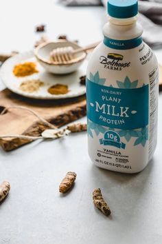 a bottle of milk sitting on top of a table