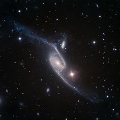 an image of a spiral galaxy in the sky