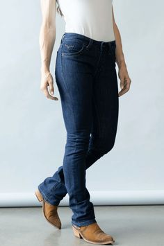 Our original women's jean, Betty is a standout favorite year after year. A mid-rise jean with a properly fitted upper thigh and knee to accentuate the leg, this straight-leg style is perfect for over boots or tucked in. The Betty is style at its best and seamlessly transitions from the saddle to the city streets. Fabric: 99% Cotton | 1% Spandex Fit: Mid-Rise, Fitted Thigh, Modest Bootcut Front Rise: 9.5" Back Rise: 16" Details: Rinse Wash Embroidered Horns Construction: 13 Oz. Denim Our jeans ha Kimes Ranch, Western Store, Jeans Outfit Casual, Bootcut Jean, Cowgirl Western, Womens Jeans, Black Shirt Dress, Women Denim Jeans, Autumn Outfit