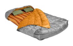 an inflatable sleeping bag with pillows on it