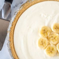 there is a pie with bananas on top