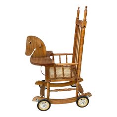 a wooden rocking chair with an elephant shaped seat