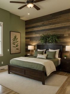 a bedroom with wood paneled walls and green bedding