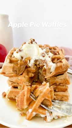 apple pie waffles on a white plate with whipped cream