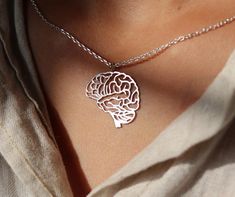 "This stainless steel brain necklace is the cutest detail measuring 0.78\"/ 0.90\". It's light weighing about 3grams. It is the perfect gift for a chiropractor, osteopath, neurologist, surgeon, and anatomy lover." Brain Necklace, Doctor Stuff, Anatomical Jewelry, Biology Jewelry, Doctor Jewelry, Classy Glasses, Nurse Jewelry, 13 Birthday, Heart Anatomy