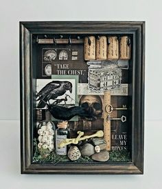 a shadow box filled with books and other items