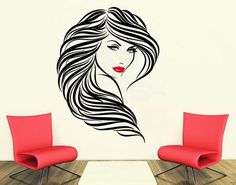 a wall decal with a woman's face and long hair