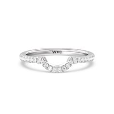 a white gold wedding band with diamonds