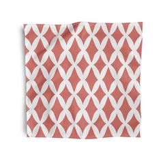 an orange and white pattern on a napkin